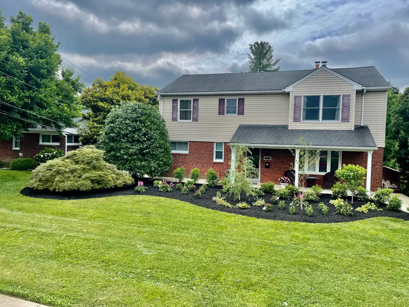 Foundation beds and layered plantings at a home