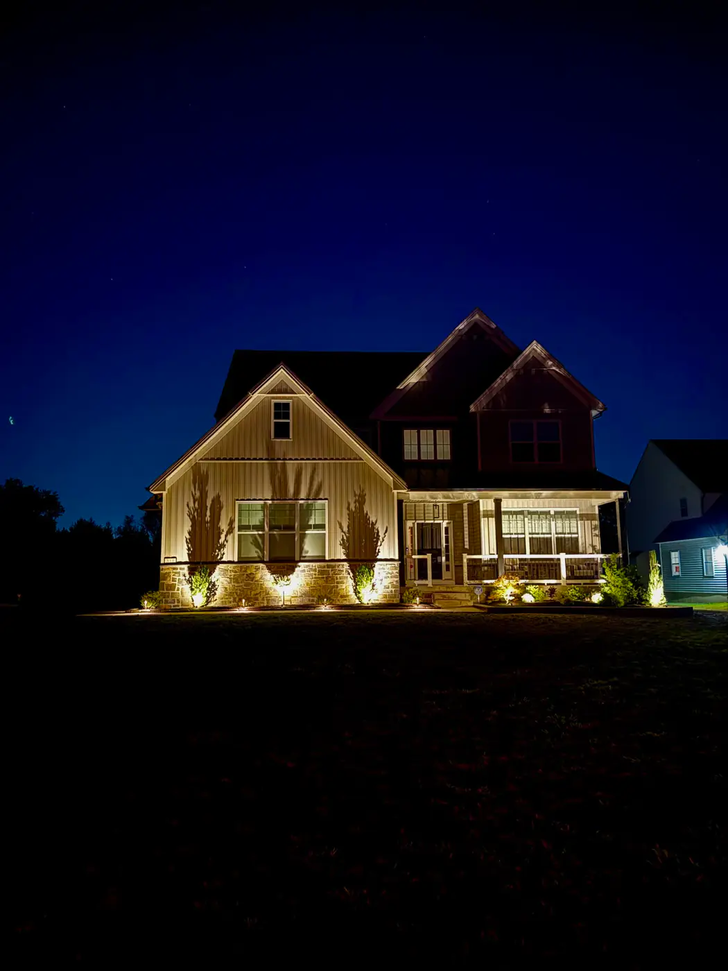 Architectural landscape lighting at dusk