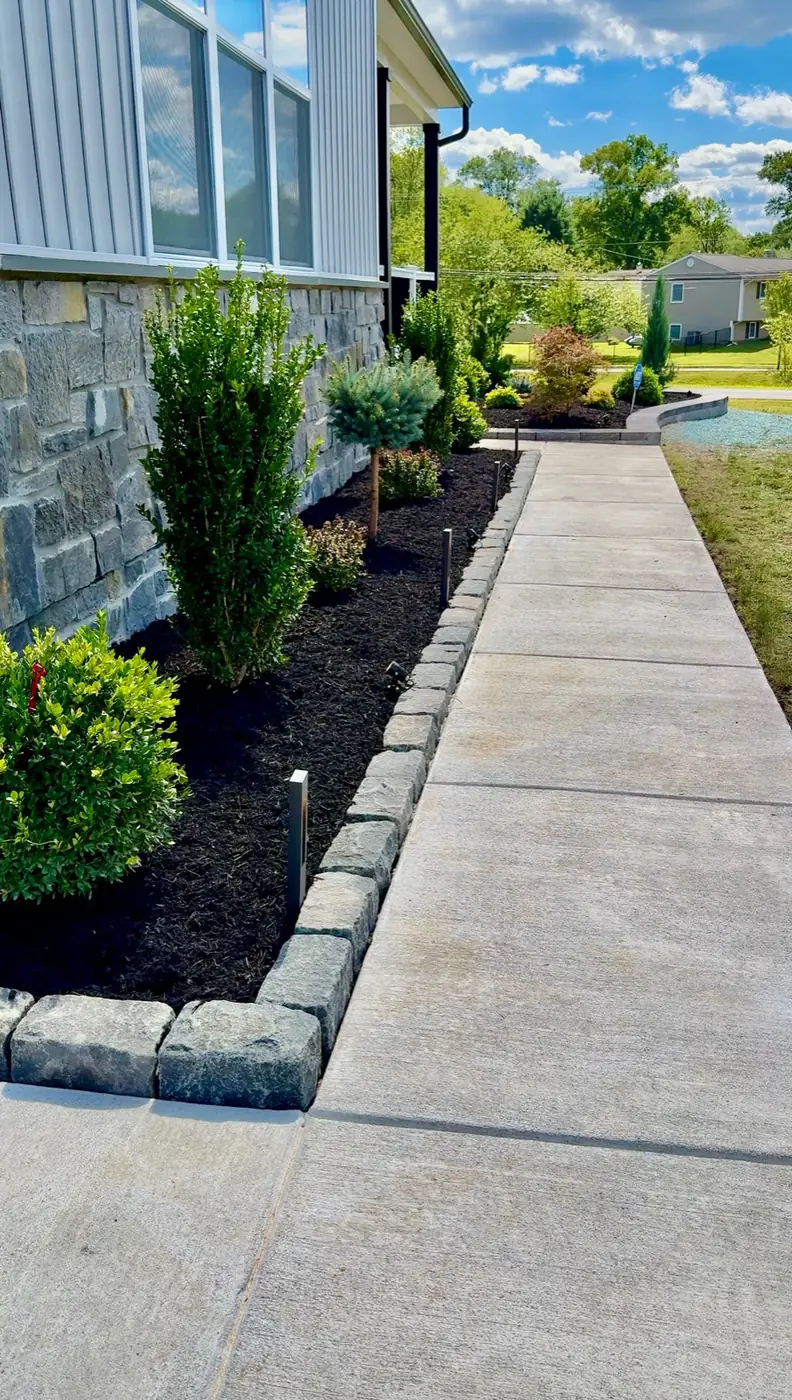 Walkway with cobblestone edging